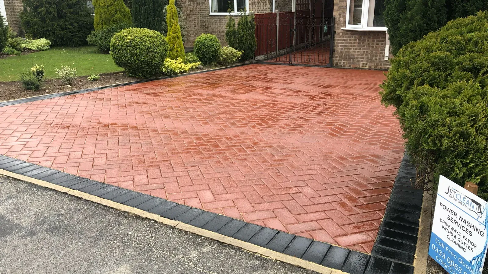 Team discussing block paving restoration projects